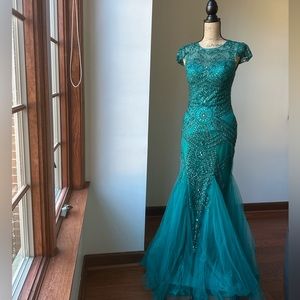 SHERRI HILL Beaded turquoise mermaid style evening gown